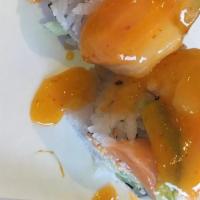 Vegas Roll · Spicy Crabmeat Crunch Cucumber Inside Topped with Our Most Popular Premium Fish Selection.

...