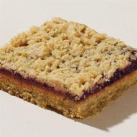 Raspberry Oat Crumble · A soft oatmeal cookie like bottom filled with raspberry preserve and a deliciously crumbly t...
