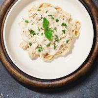 We Love Alfredo Pasta (Fettuccine) · Fettuccine pasta cooked in creamy white sauce topped with parmesan.