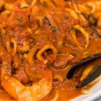 Shrimp Fra Diavolo · Shrimp, mussels, calamari, clams, and spicy marinara sauce.