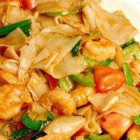Drunken Noodles · Spicy. Thai soft wide rice noodles sautéed with stir-fried chili, garlic, fresh basil, onion...