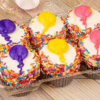 Six Pack Cupcake · Three yellow cupcakes and three chocolate cupcakes.  As always, these are filled and finishe...