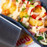 Shake Down Shrimp · flash fried shrimp, shredded cabbage, pico. de gallo, chipotle ranch, cilantro, pickled. fre...