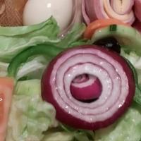 Chef'S Choice Salad · Iceberg lettuce, tomatoes, red onion, green pepper, ham, turkey, corned beef, provolone and ...