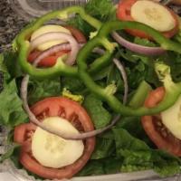 Large Garden Salad · Freshly chopped crisp romaine topped with red onions, cucumber, tomatoes and crunchy green p...