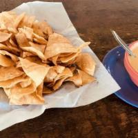 Chips & Queso · El Milagro corn tortillas cut into chip sizes, and in house fried for your dipping pleasure....