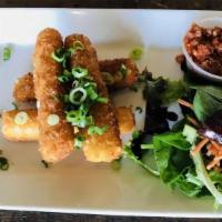 Fried Fontina Cheese Sticks · Pepperoncini pepper and olive relish.