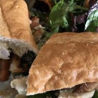 The Sala- Signature Sandwich · Served with crispy French fries inside the sandwich and a side salad.

lemon roasted pulled ...