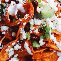 Chilaquiles Rojos Plate · [Tortilla Chips topped with Crumbling Cheese & Red Salsa]
[Migas cubiertas con Queso Fresco ...