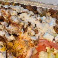 5-Beef Shawarma Plate · Gluten-free. Beef Shawarma rice & salad with white sauce and spicy sauce.