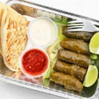 25-Dolma · Vegetarian. 6 dolmas, pita bread with white sauce and spicy sauce.