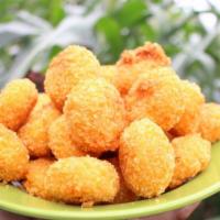 Corn Nuggets · Golden, deep-fried, creamed corn nuggets. Crispy on the outside and soft and sweet, creamy c...
