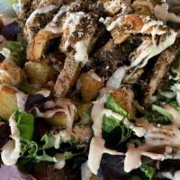 Jerk Chicken Caesar Salad · Fall greens and romain tossed in caesar dressing topped w/ house made croutons, parmesan che...