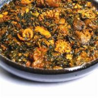 Efo/Spinach · This delicious dish is filled with flavor! By combining tomatoes, spinach, meat, peppers, an...