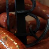 Jalapeno Cheddar 1/2 Lbs · Cousins Hand-Crafted Jalapeno Cheddar Sausage. Made with Beef and Pork.