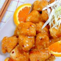 Orange Chicken · Crispy chicken wok-tossed in a sweet and orange sauce.