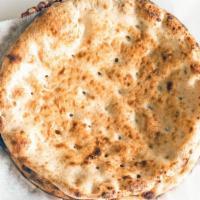Plain Naan · Leavened, tandoor-baked flatbread brushed with melted butter.