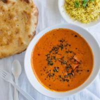 Butter Chicken · A mildly spiced curry sauce made from chicken tikka. Butter, special spices, and garnished w...