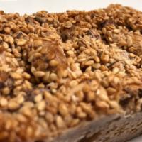 Sesame Crunch · Sesame seeds, walnuts, peanuts, almond, oats, organic, cane sugar.