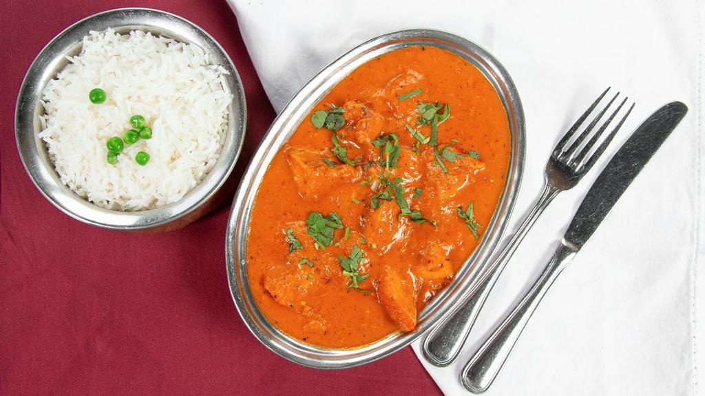 Chicken Tikka Masala · Chicken breast marinated in spices and yogurt baked in a tandoor oven and cooked in a creamy onion and tomato sauce.