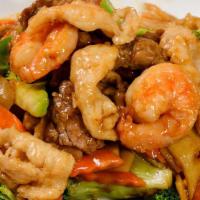 Triple Delight · Shrimp, chicken & beef sauteed with mixed vegetable in brown sauce.