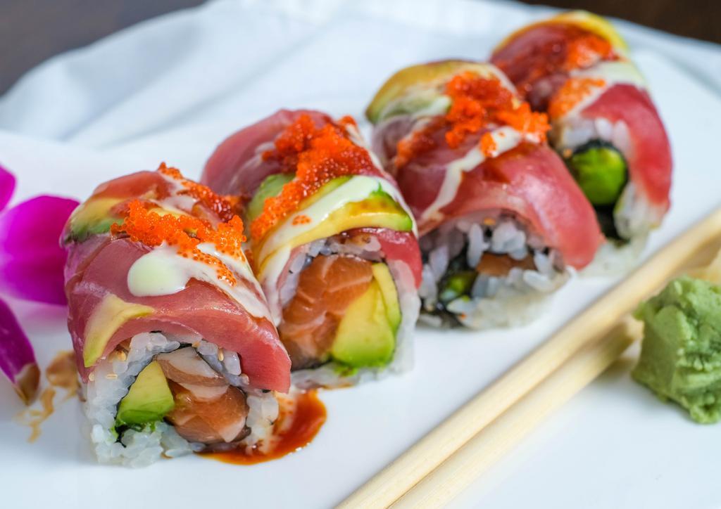 Sunrise Roll (8 Pieces) · Spicy. Spicy yellowtail and crunch inside, salmon, and avocado outside finish with eel sauce, wasabi mayo, spicy mayo and scallion and masago on top.