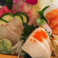 Sashimi Dinner · 16 pieces of sliced assorted raw fish.