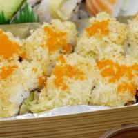 Crunchy Roll · 2 pieces of shrimp tempura, avocado, and crab inside and topped with crunchy tempura flakes ...