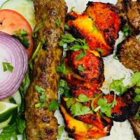 Family Kabob Special · Combination of 3 pieces bonelees chicken, 3 pieces of lamb and 1 skewer of seekh kabob. Serv...