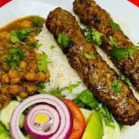 Seekh Kabob · 2 skewers. Ground beef mixed with house spices. Grilled and served with basmati rice, chickp...