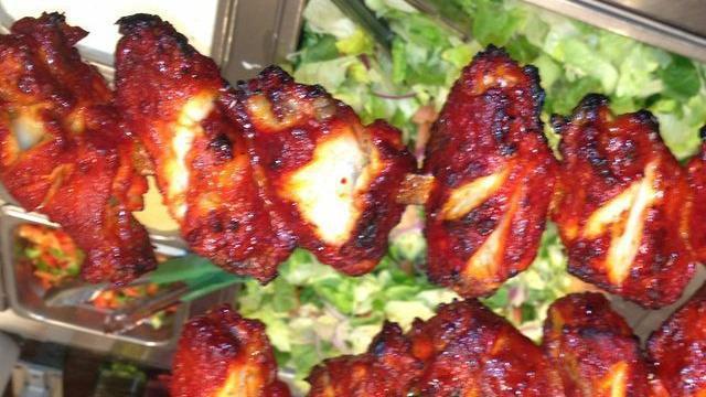 Salmon Tandoori Kabobs (Special) · Fillets of salmon marinated with yogurt, turmeric and spices.