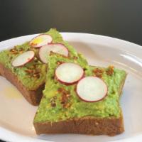 Avocado Toast · Fresh avocado on brioche topped with freshly sliced red radish, chili flakes, and light oliv...
