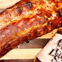 Baby Back Ribs · A full rack of the most tender, meaty, fall-off-the-bone ribs, hand-rubbed with Lefty's spic...
