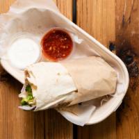 Chicken Shawarma Wrap · Chicken marinated, thin sliced wrapped in a pita bread with tomato and onions. Includes whit...