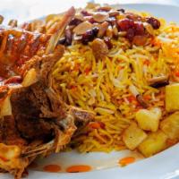 Goat Dum Biryani · Fragrant long-grained rice is layered with baby goat that have been cooked in a mixture of s...