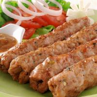 Malai Chicken Kabab · Minced chicken added with spices and herbs perfectly cooked on the grill.