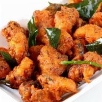 Gobi Manchurian · Popular Indo-Chinese dish, gobi manchurian has crispy cauliflower florets tossed in a spicy,...