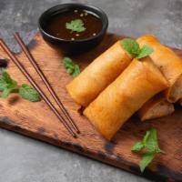 Veg Spring Roll (6Pcs) · Six pieces. Mixed vegetable stuffing wrapped in thin translucent roll sheets.
