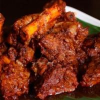 Goat Sukha · Tender goat meat with bones cooked on a slow fame and tossed with spices.