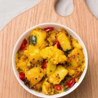 Aloo Gobi Masala · Potato and cauliflower stewed with cumin, ginger and tomato.