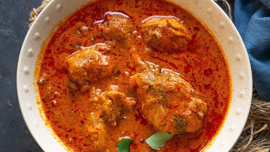 Murg Chettinad · Chicken made with roasted ground exotic spices peppercorn, star anise and coconut.