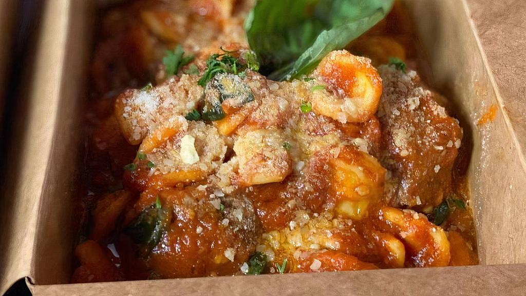 Pasta With Meatballs · Pasta with tomato sauce with homemade meatballs.