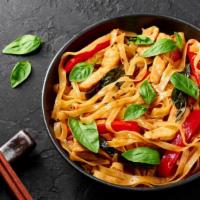 Drunken Noodles · Medium spicy. Wide rice noodles, onions, bell peppers, tomatoes, garlic, Thai basil, fresh c...