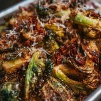 Fried Brussel Sprouts · Deep Fried Brussels, Finished with Bacon, Lemon Zest & Parmesan Gremolata