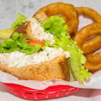 Tuna Salad Sandwich · White albacore tuna, mayo, celery, onion, lettuce, tomato, pickle spear, wheat toast.