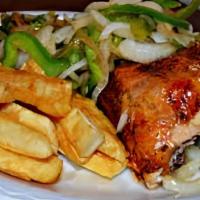 Grilled Combination Platter · 1/4 chicken, carnitas, chorizo, coleslaw, and fries.