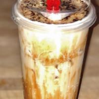 Iced Classic Milk Tea · Customize your traditional milk tea with any quality teas. This lactose-free beverage is per...