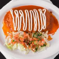 Wet Burrito · Spicy. Served with beans, rice, and choice of meat, topped with homemade red enchilada sauce...