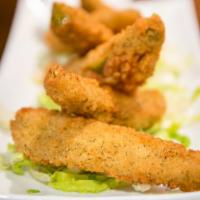 Fried Pickles · Deliciously prepared pickles, battered and deep-fried.