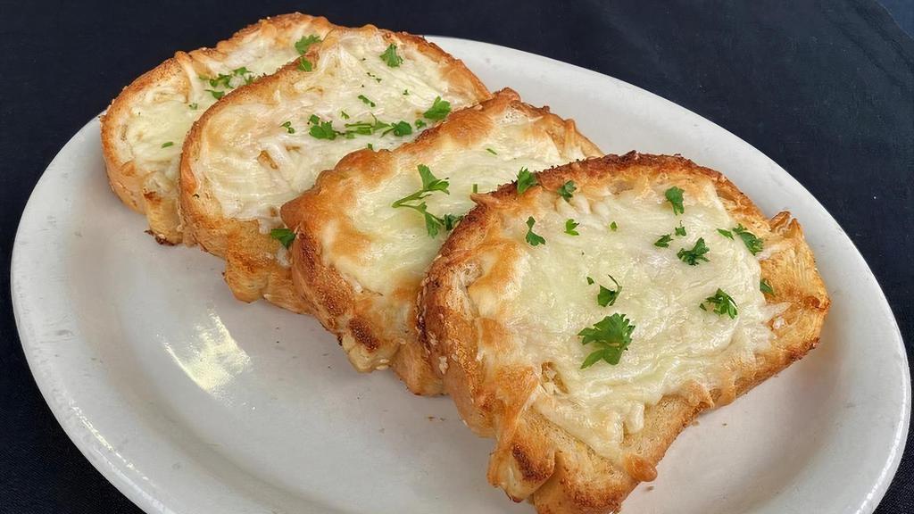 Garlic Cheese Bread · 4 pieces of Garozzos bread, toasted with butter garlic and cheese